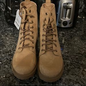 Brand new tan boots with ticket still.